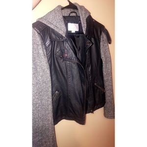 Leather jacket with sweater sleeves